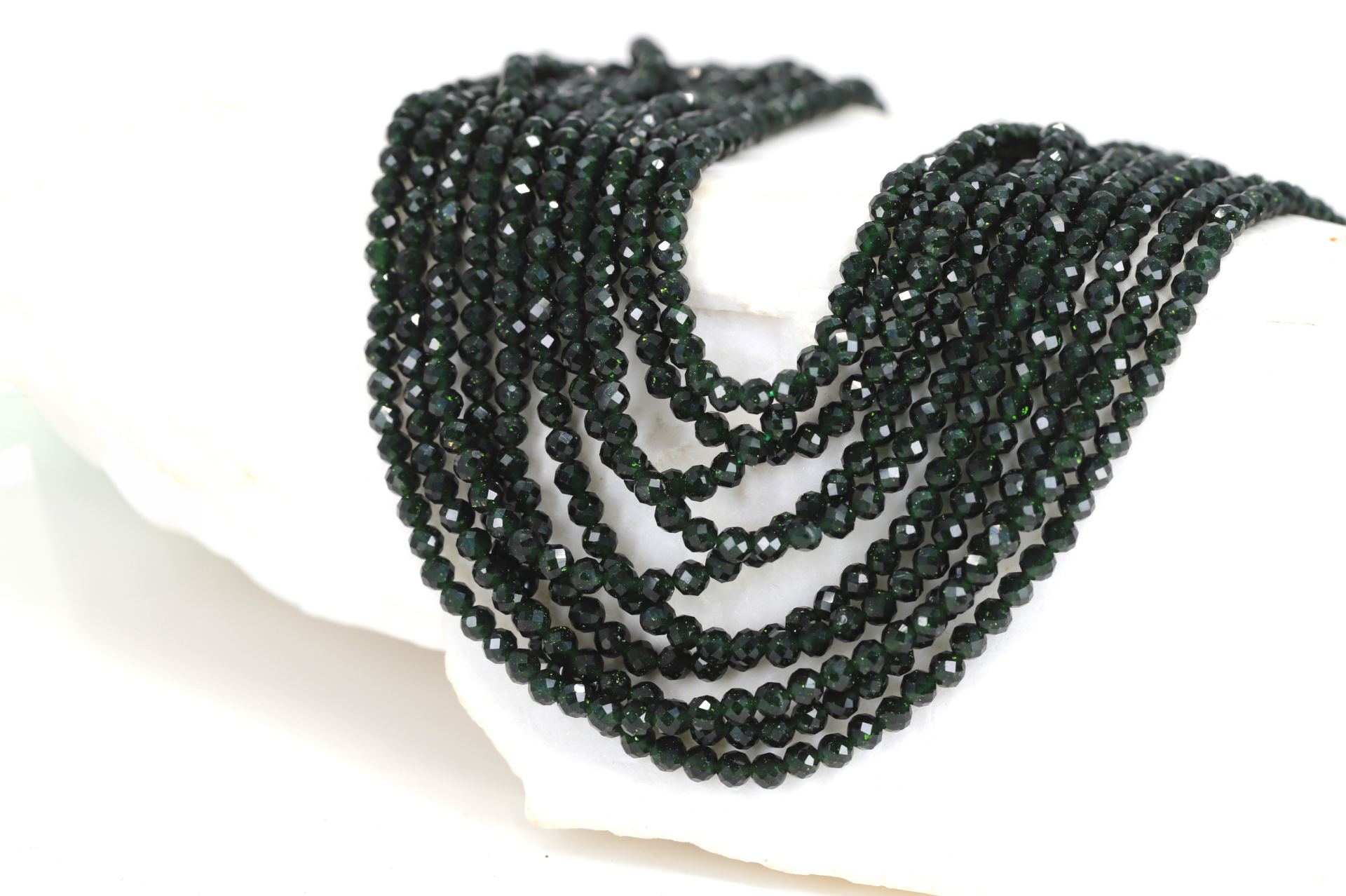 3mm-round-faceted-goldstone-stones