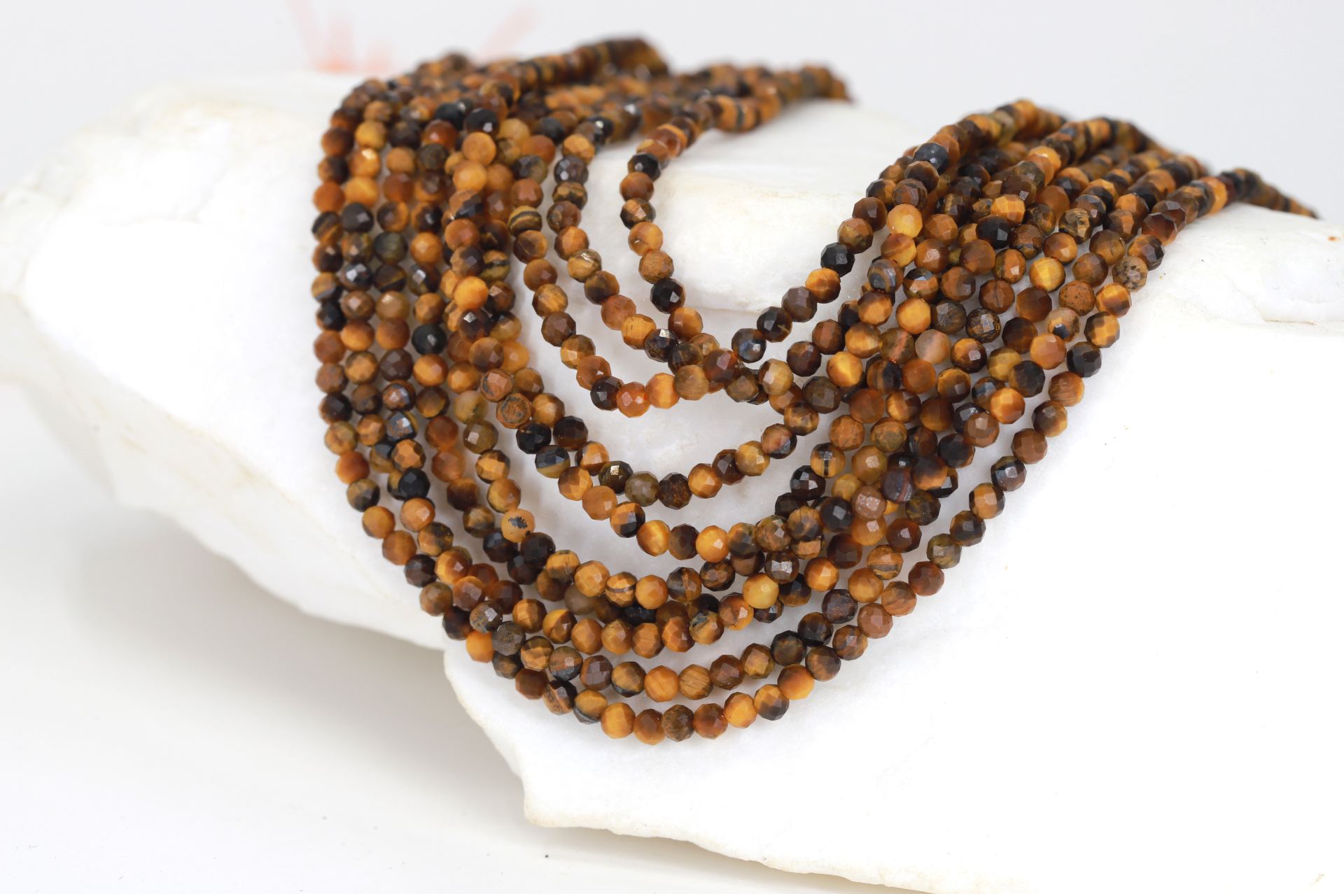 3mm-round-faceted-tiger- eye-stones