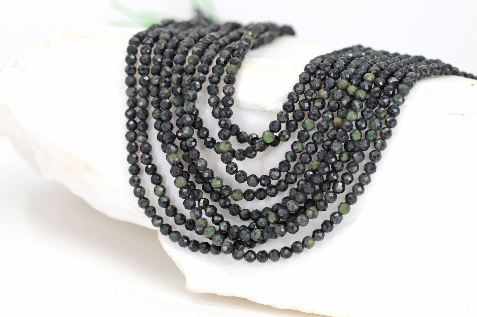 3mm-round-faceted-serpentine-stones