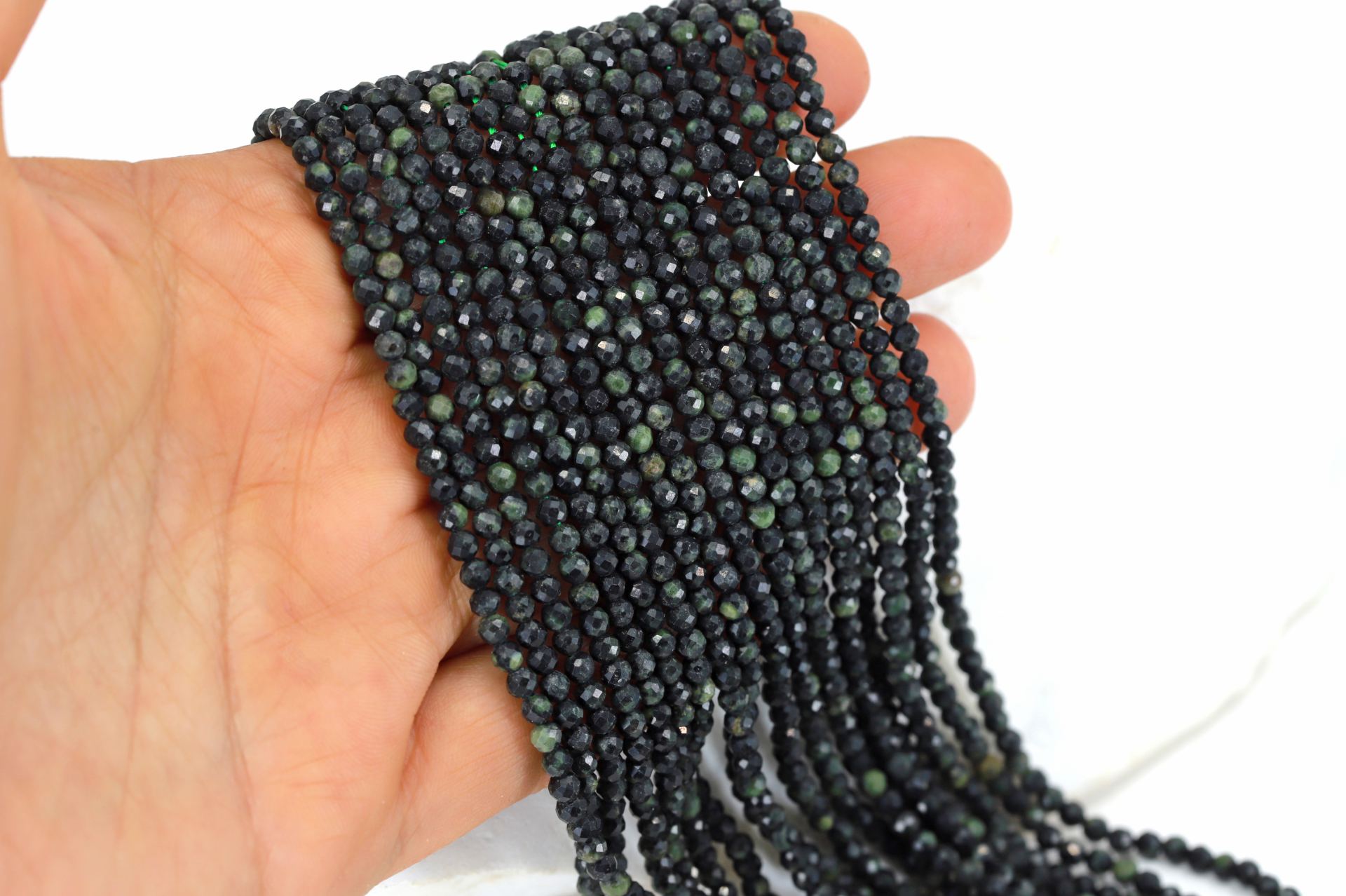 3mm-round-faceted-serpentine-beads
