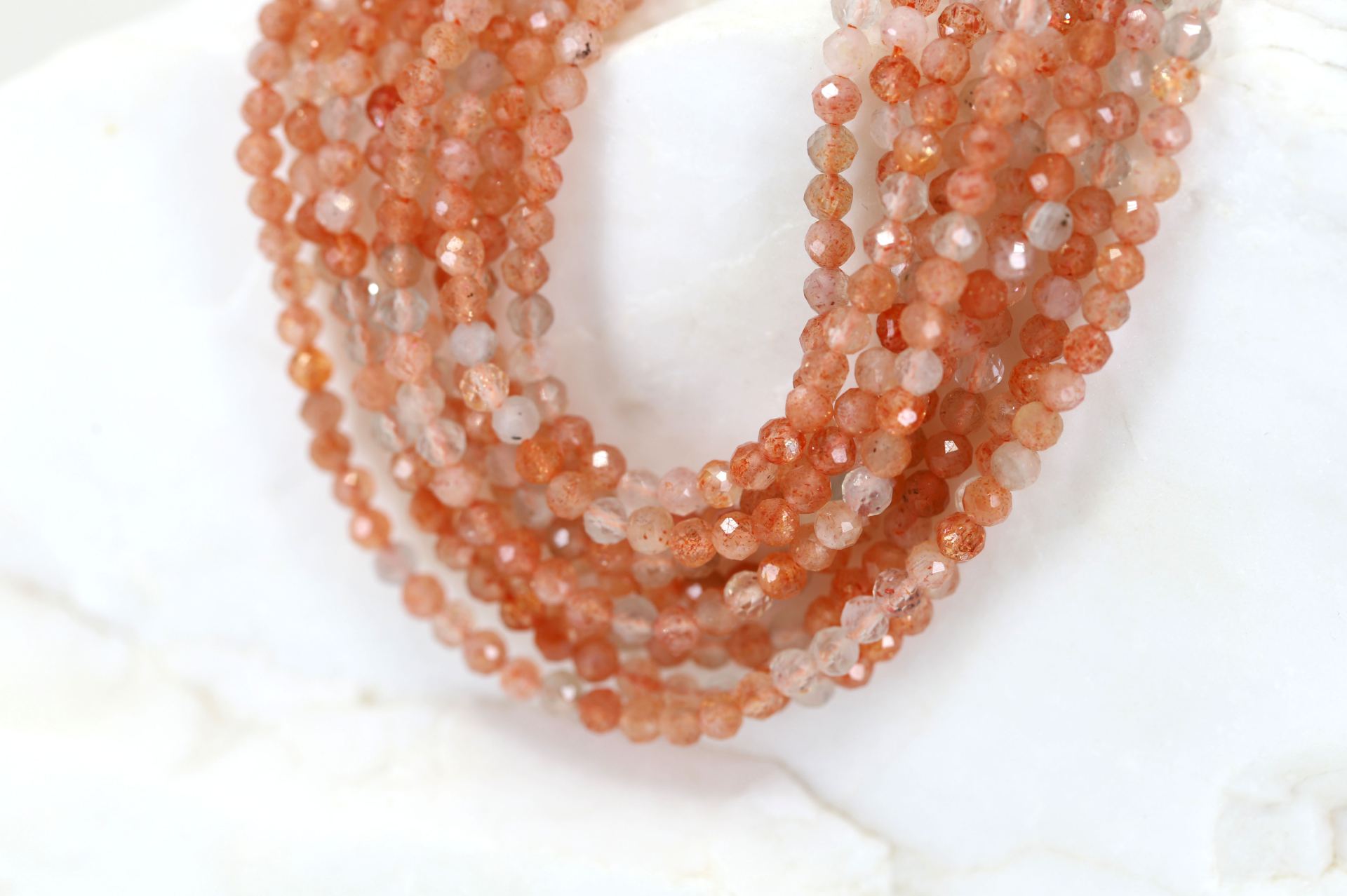 3mm-round-faceted-sunstone-stones