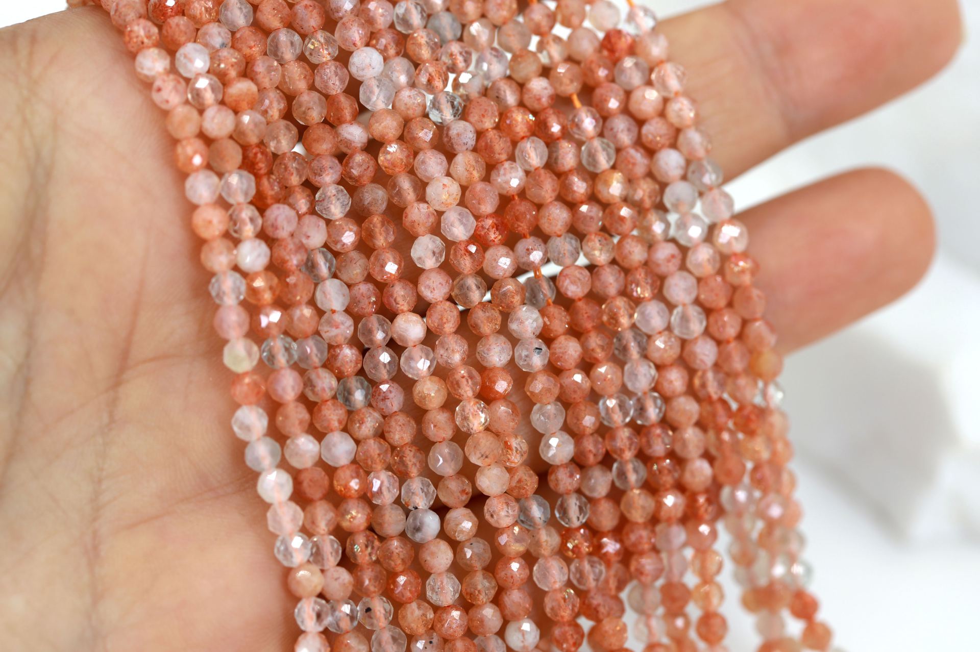 3mm-round-faceted-sunstone-beads