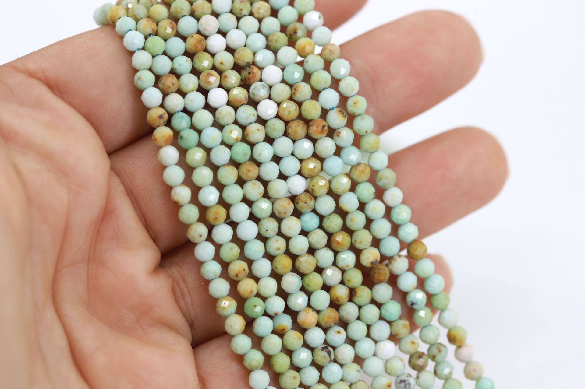 3mm-round-faceted-phoenix-turquoise