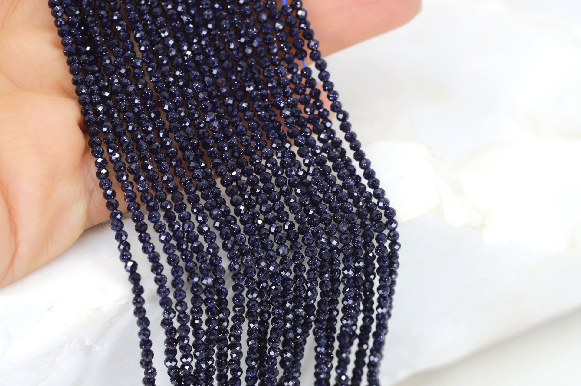 2mm-goldstone-beads-round-faceted