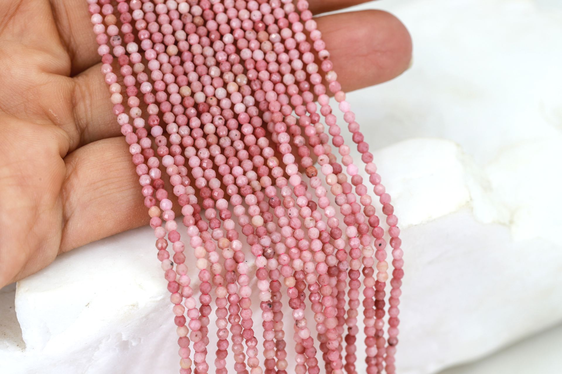 2mm-rhodocrosite-round-faceted-beads