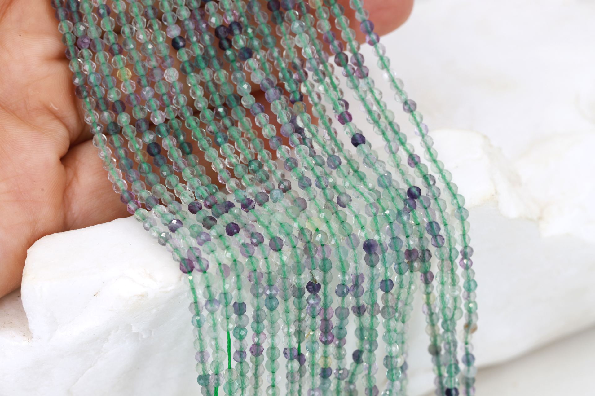 2mm-fluorite-round-faceted-beads