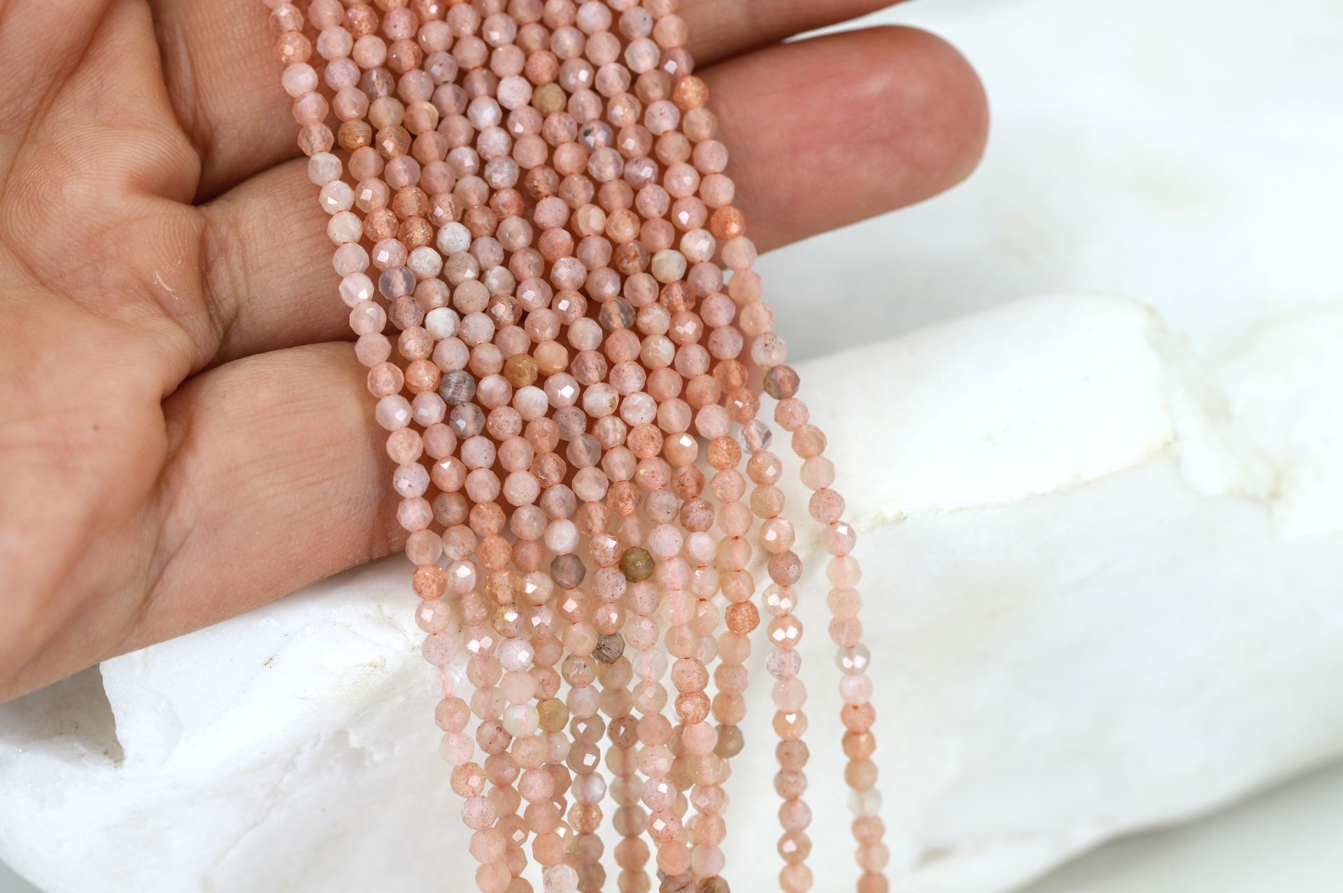 2mm-round-faceted-sunstone-beads