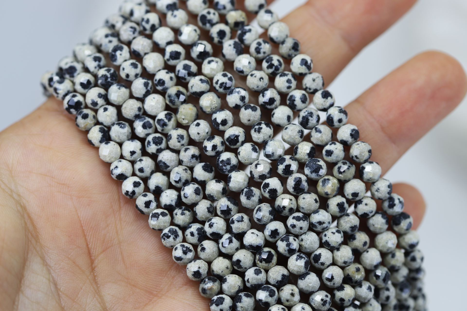 4mm-faceted-round-dalmatian-jasper-beads