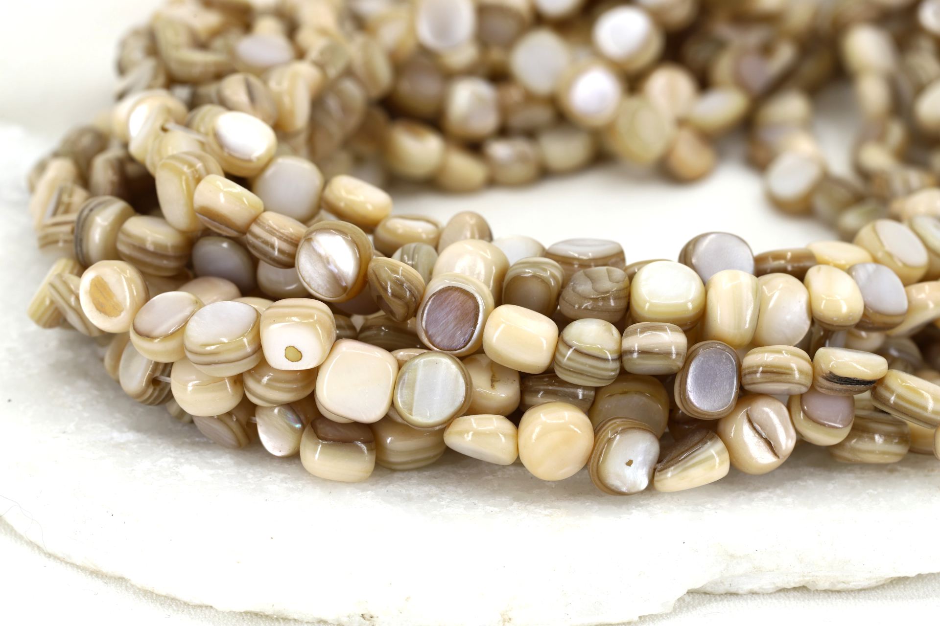 8mm-beige-shell-asymmetric-flat-round