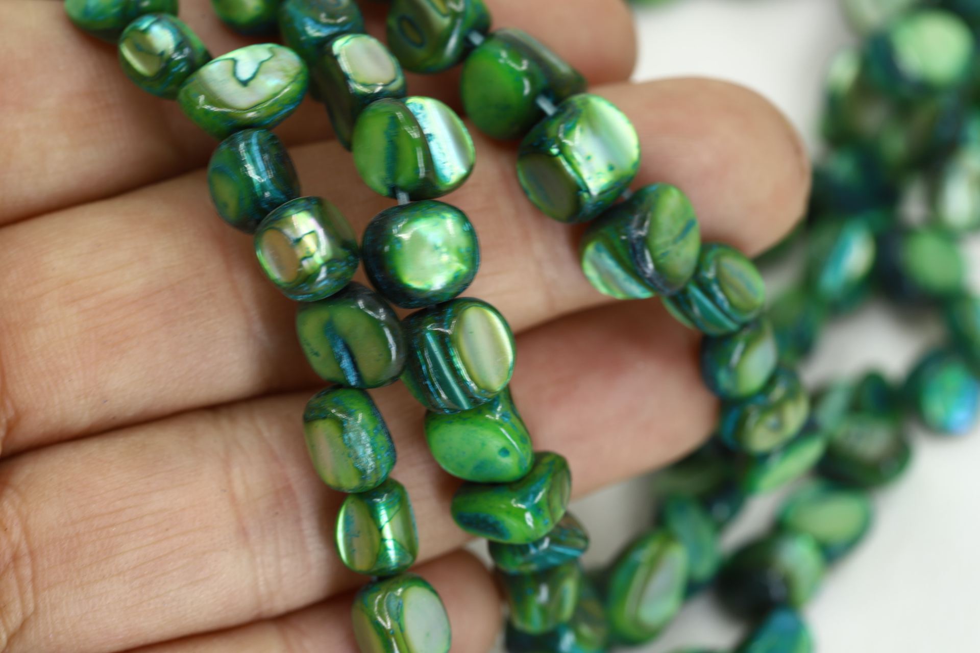green-shell-beads-asymmetric-flat-round