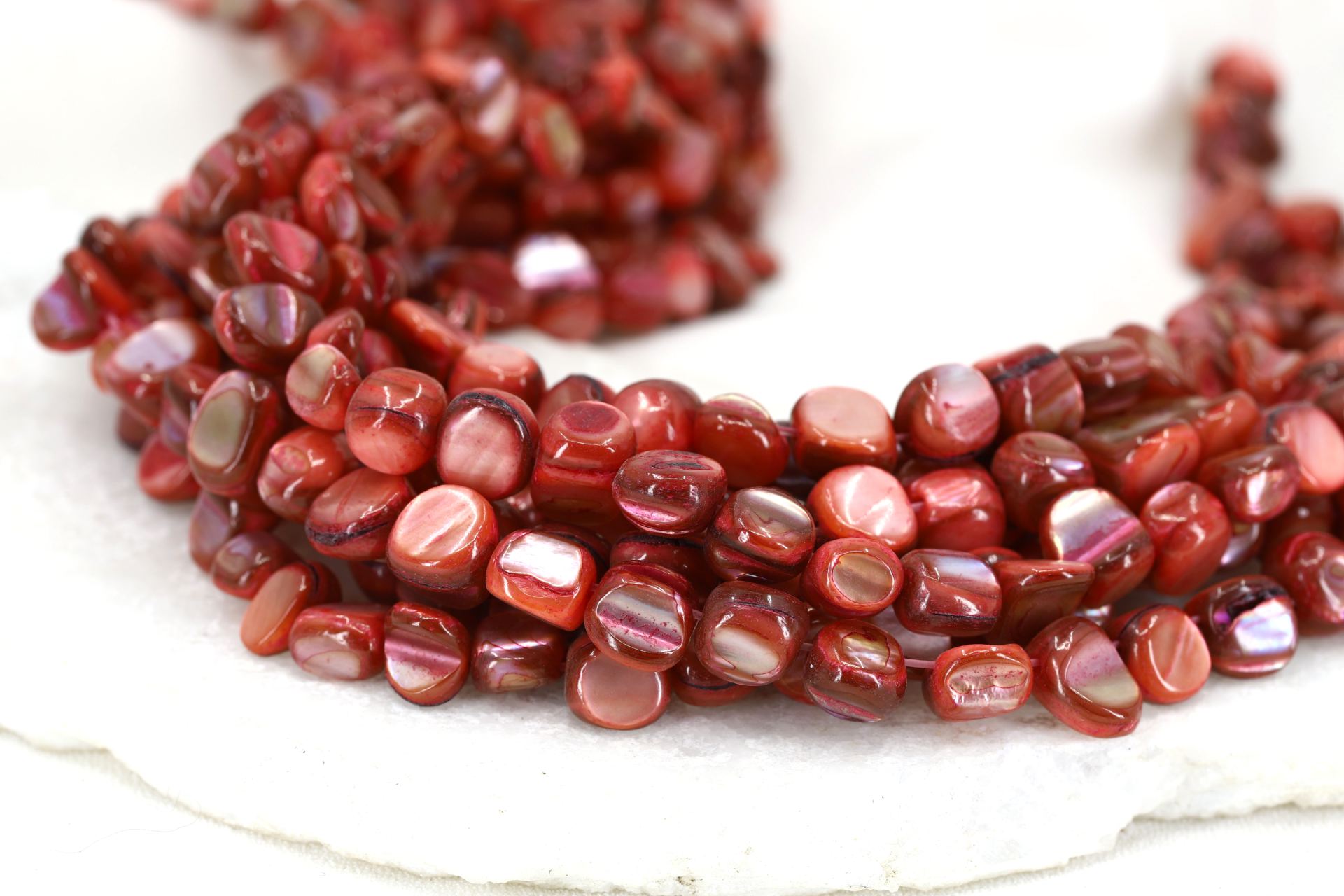 8mm-maroon-shell-asymmetric-flat-round