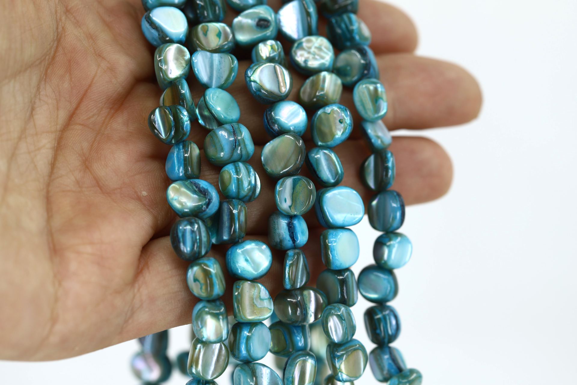 8mm-turquoise-asymmetric-shell-strand