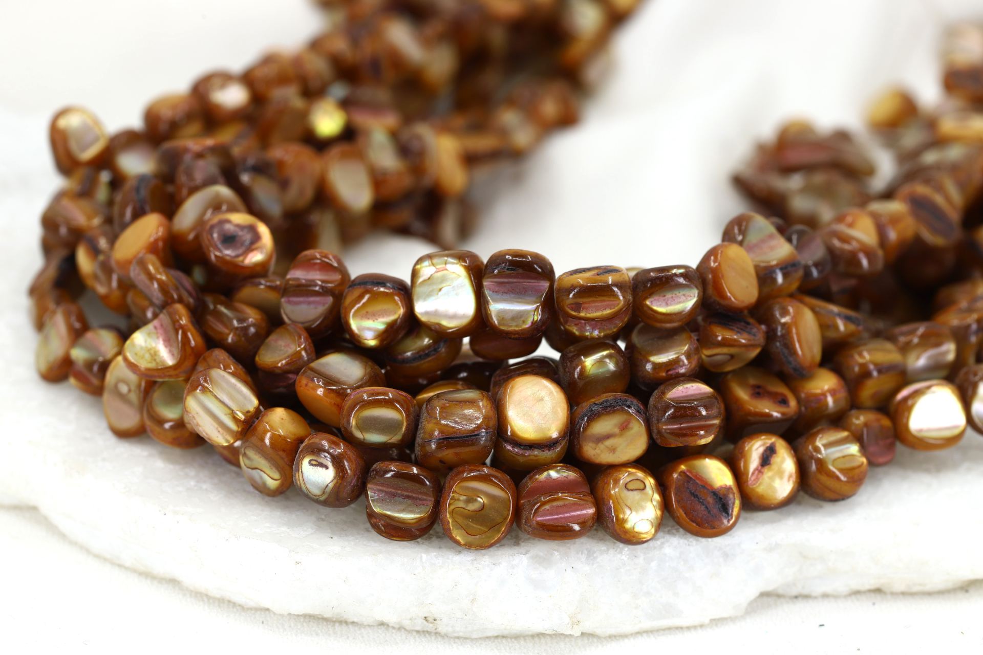 8mm-brown-shell-asymmetric-flat-round