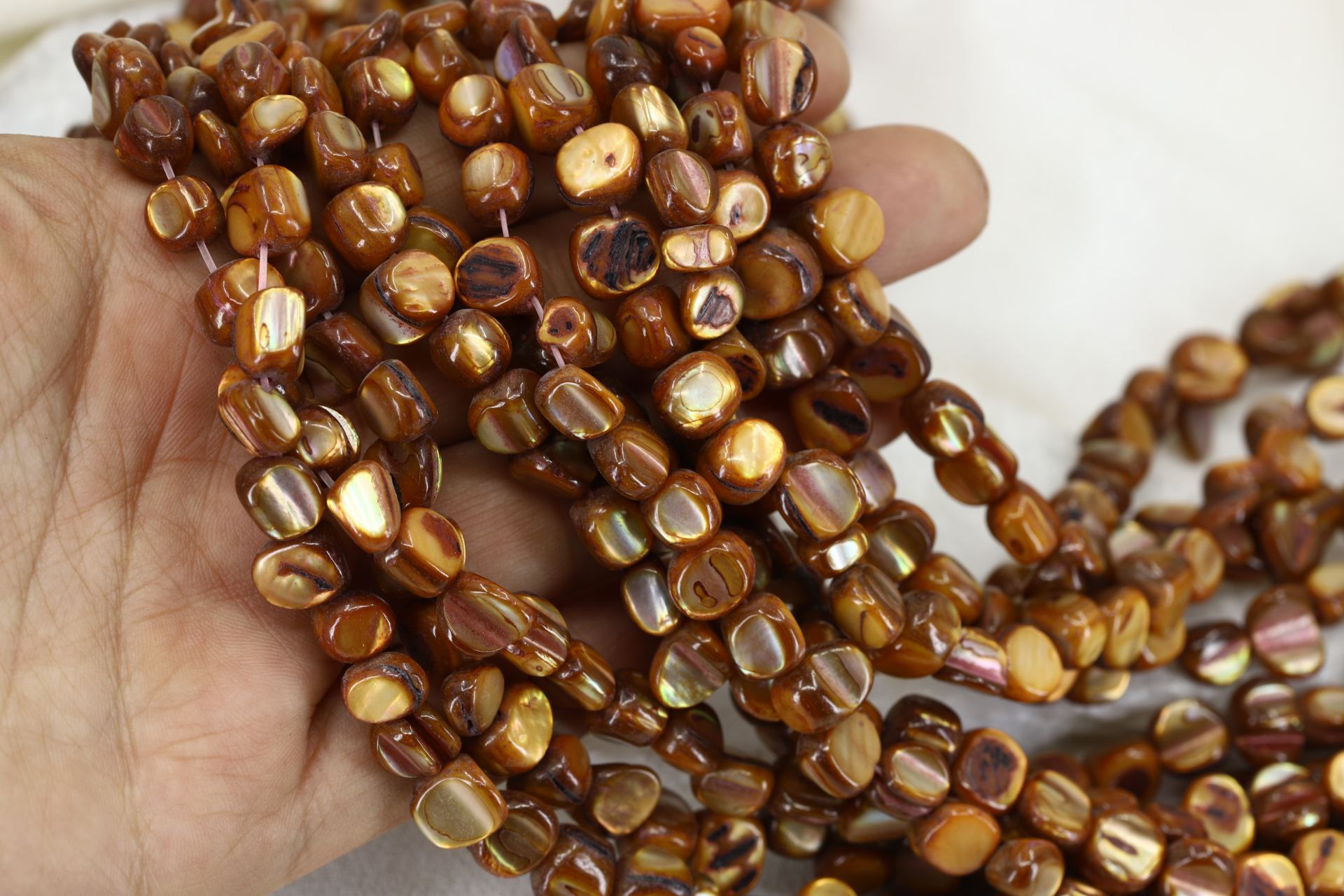 8mm-brown-asymmetric-shell-beads-strand
