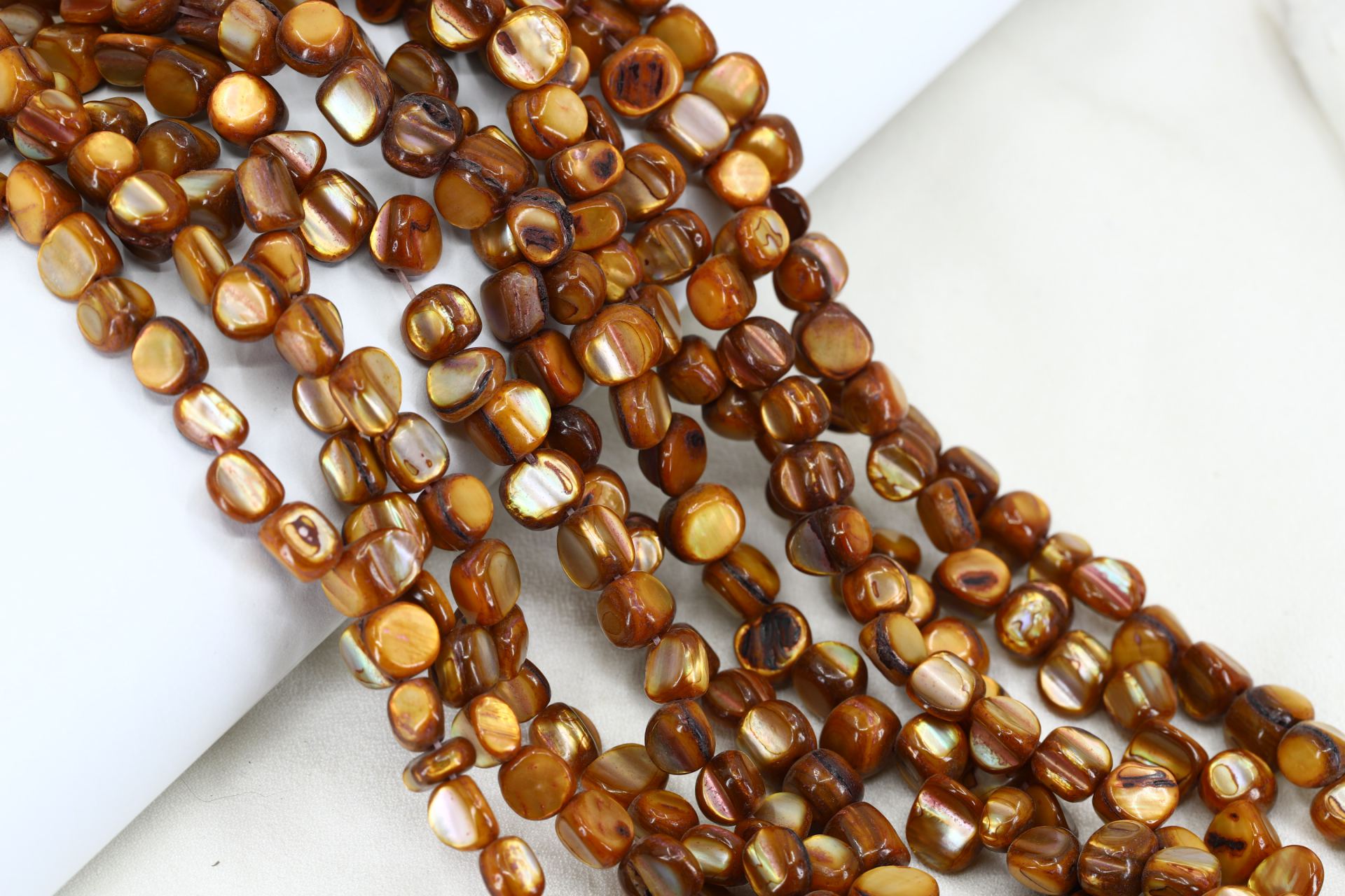 brown-shell-beads-asymmetric-flat-round