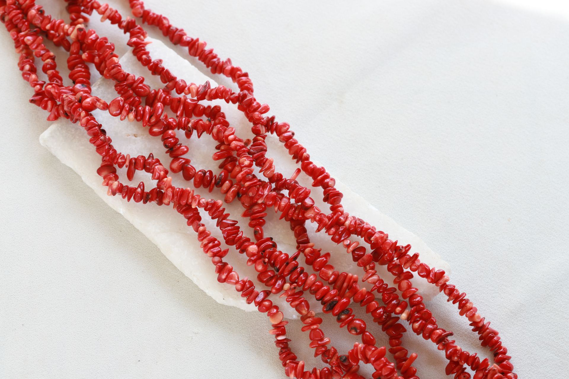coral-red-small-chip-beads-strand