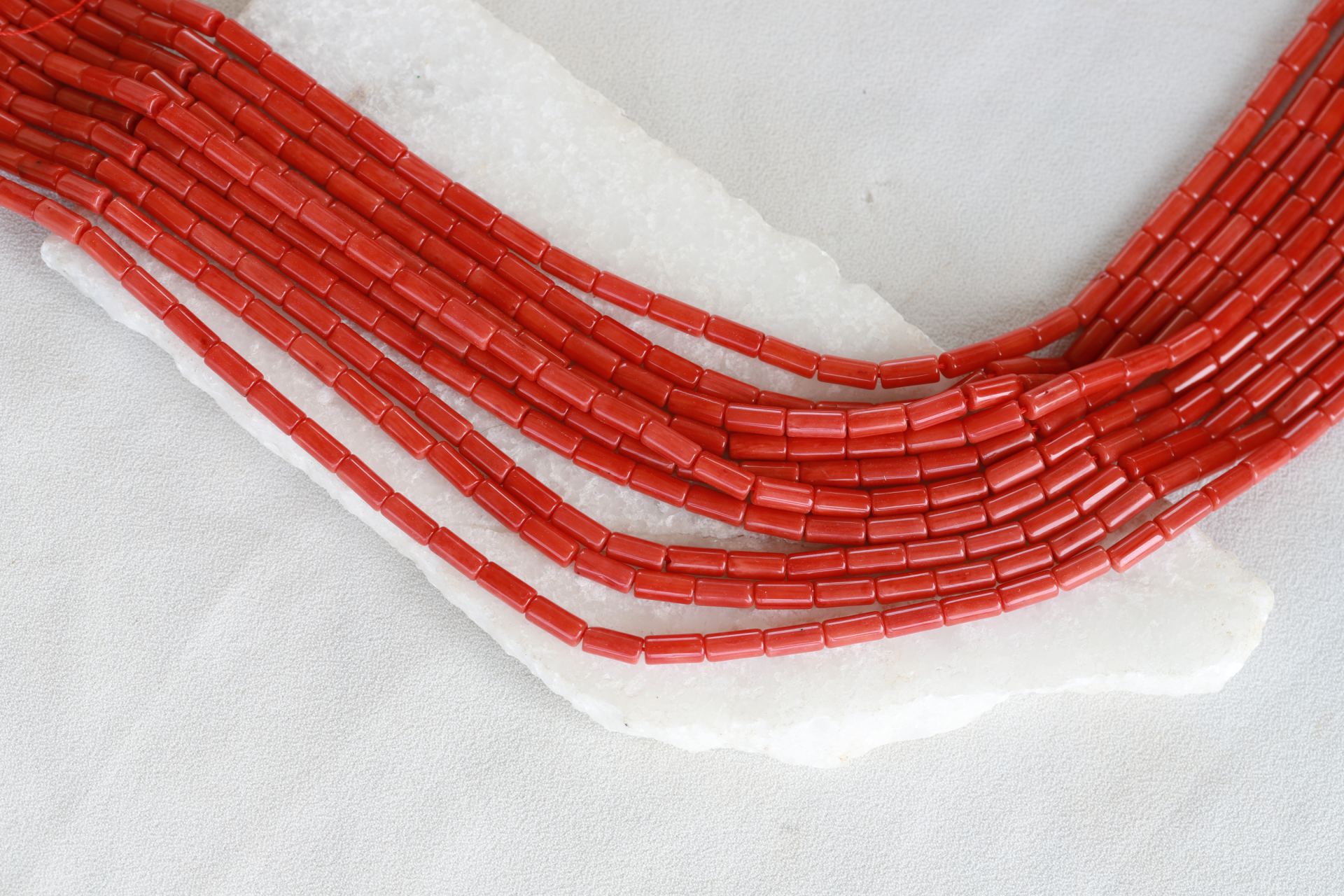 red-coral-mini-tube-beads-strand