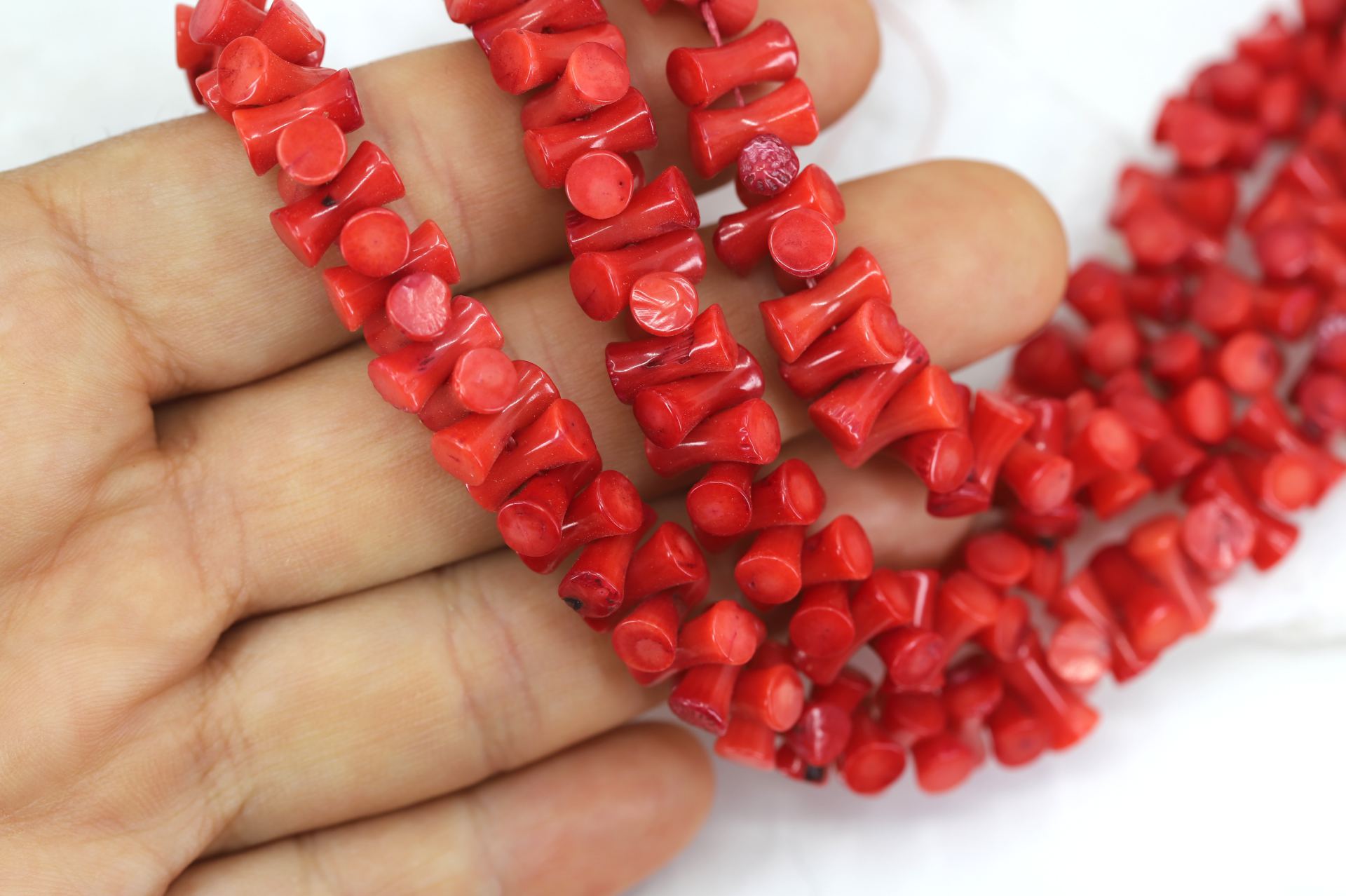 9mm-drilled-bow-natural-coral-beads