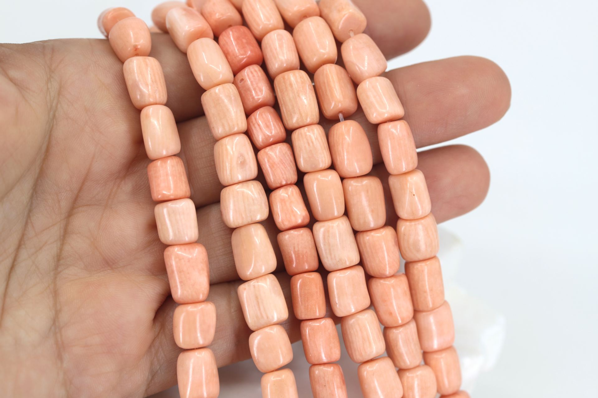 pink-natural-coral-barrel-beads-strand