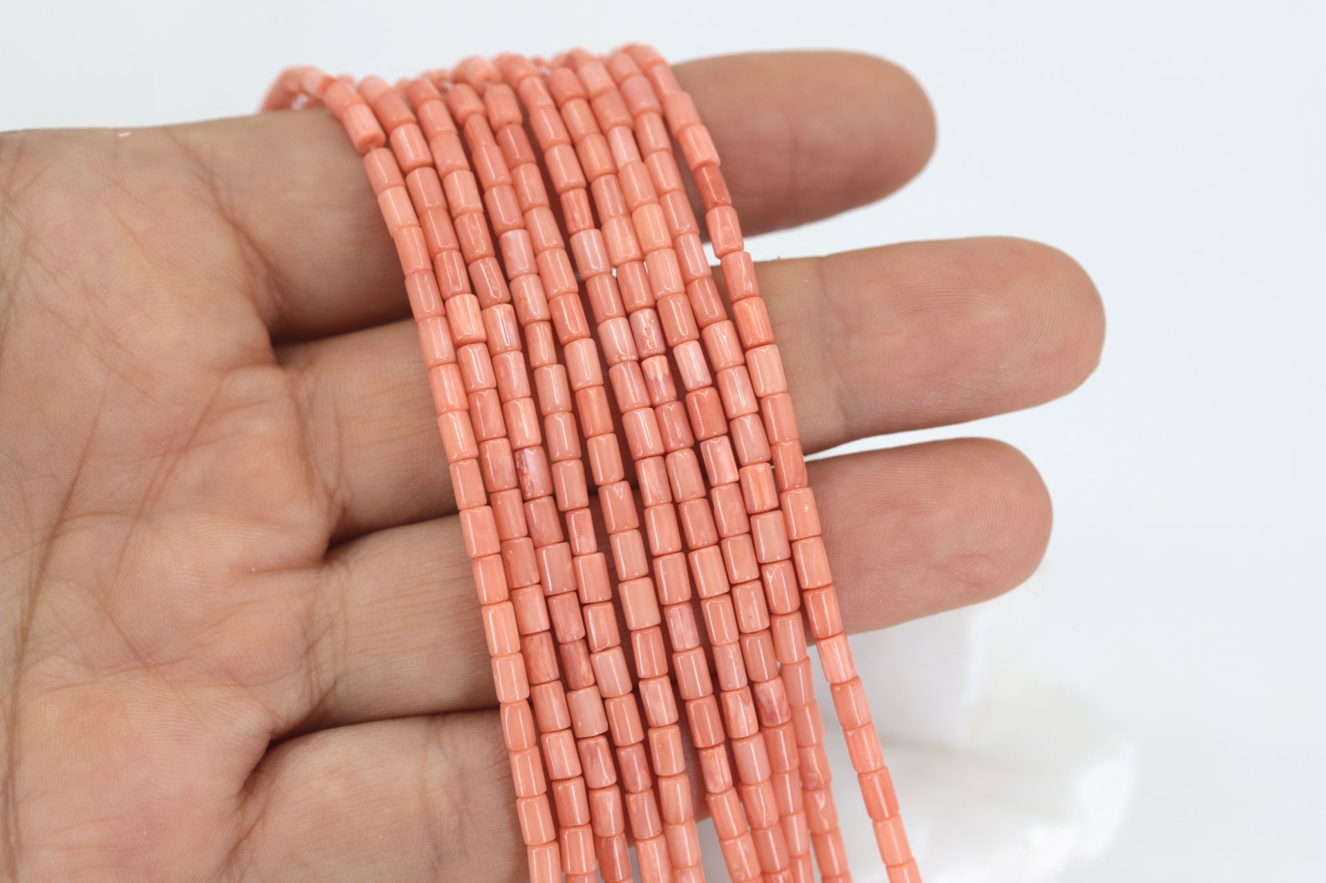 mini-tube-coral-pink-beads-strand