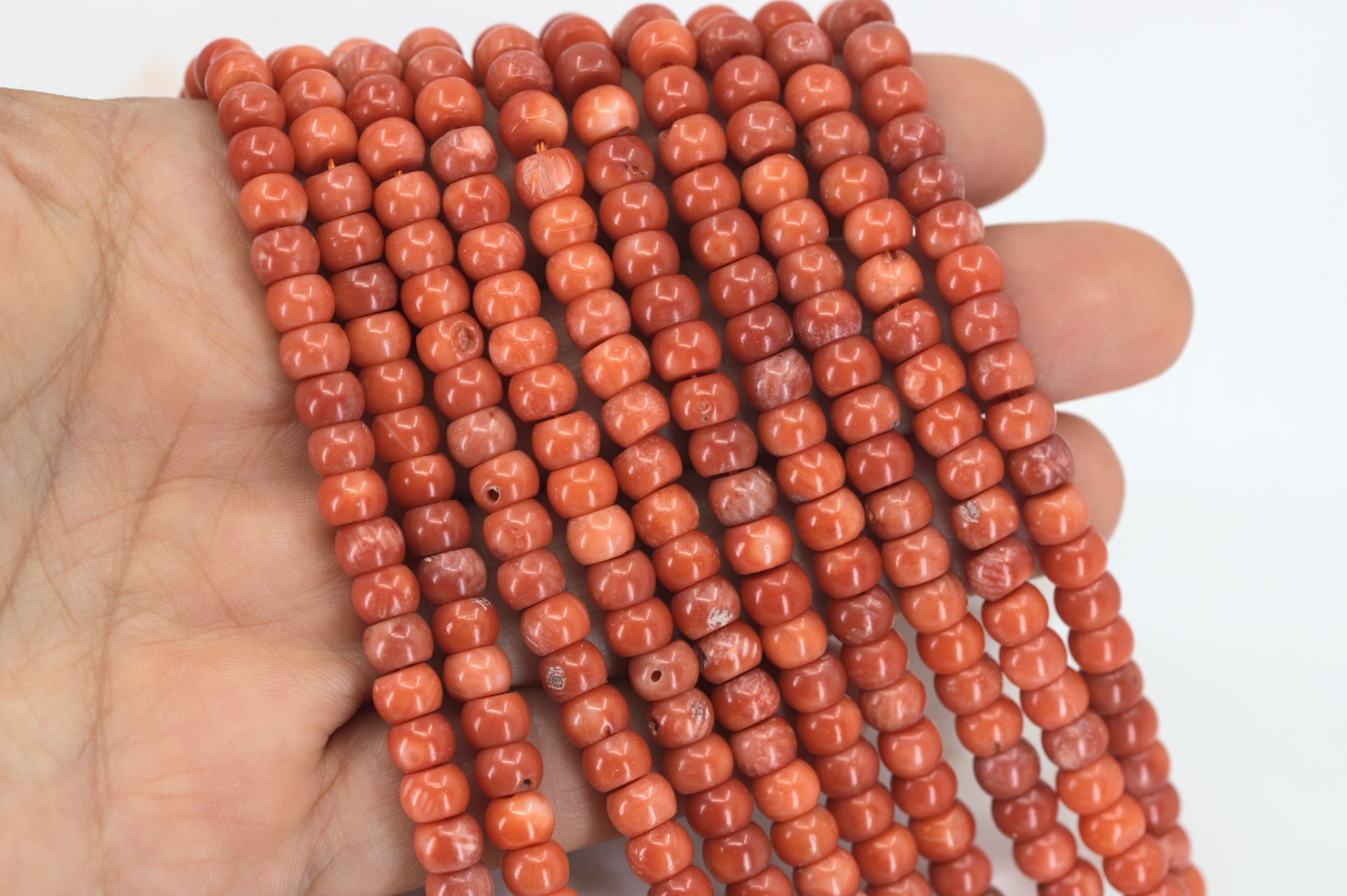 orange-rondelle-coral-beads-strand