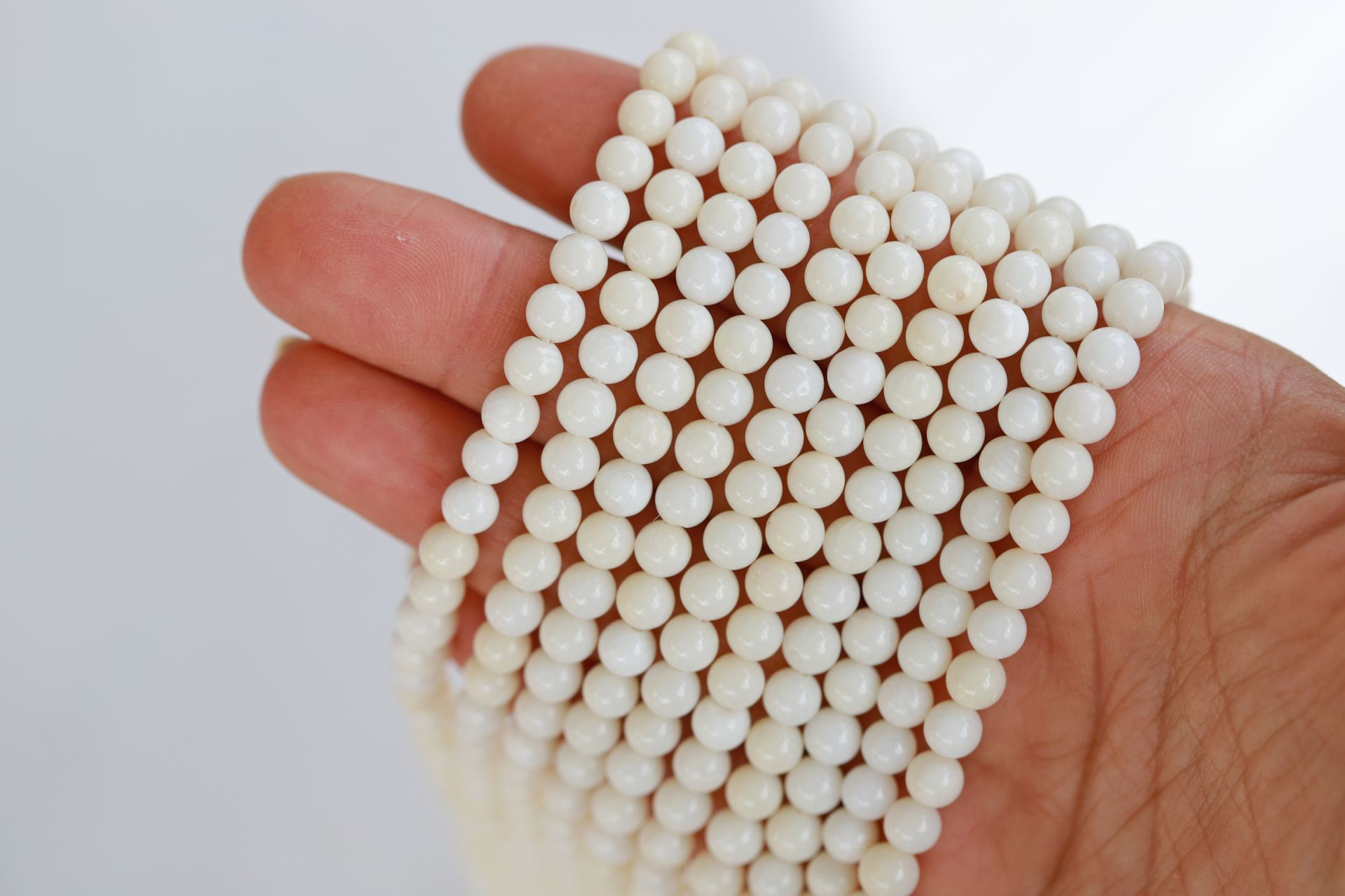 white-round-ball-natural-coral-beads