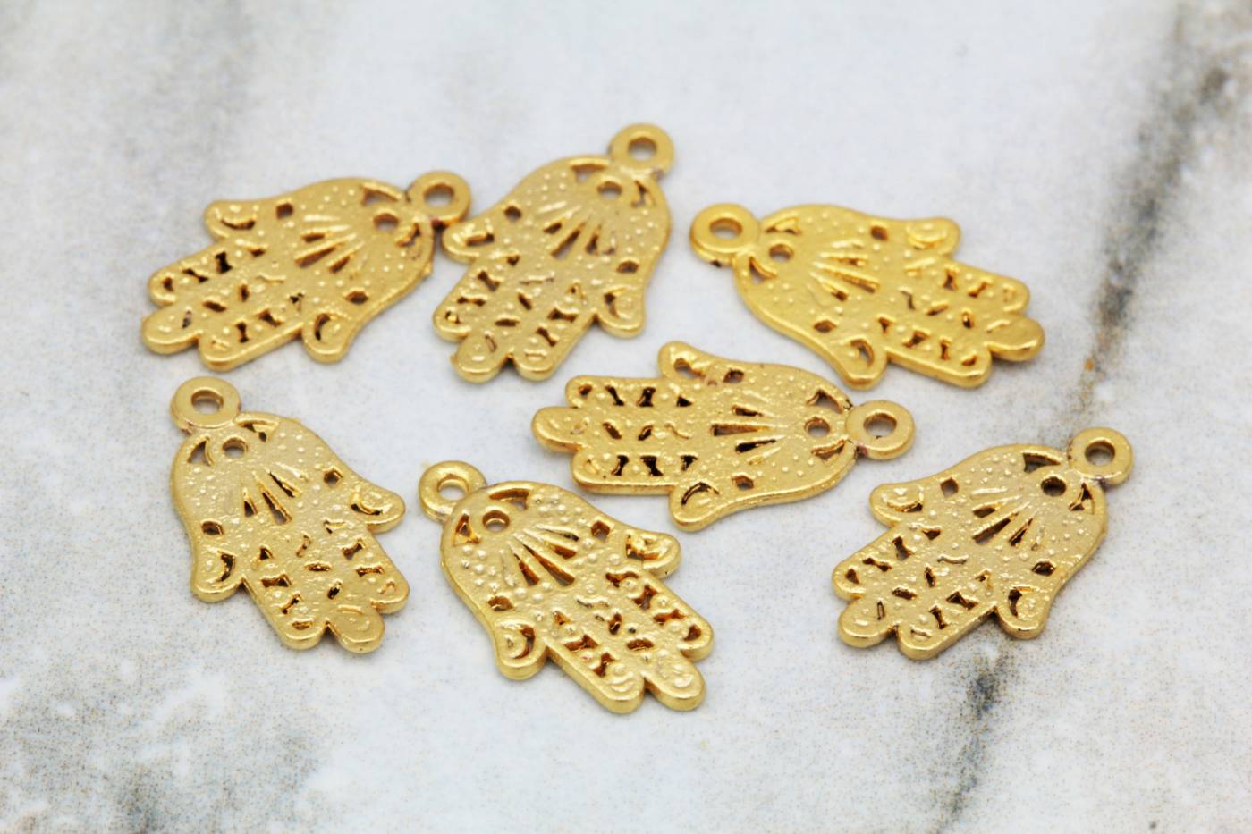 gold-plated-tiny-hamsa-hand-pendants
