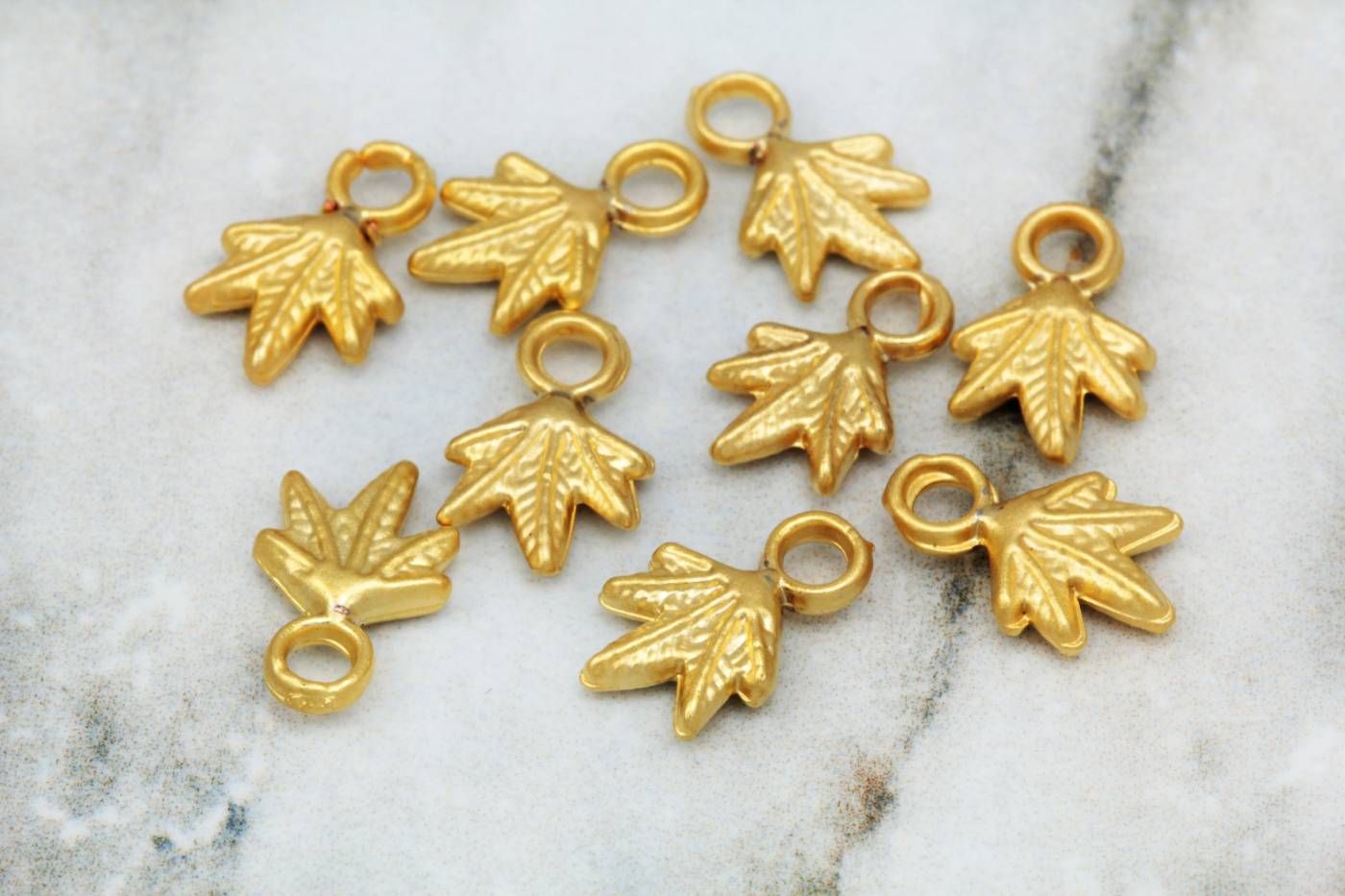 gold-mini-cannabis-marijuana-leaf-charm