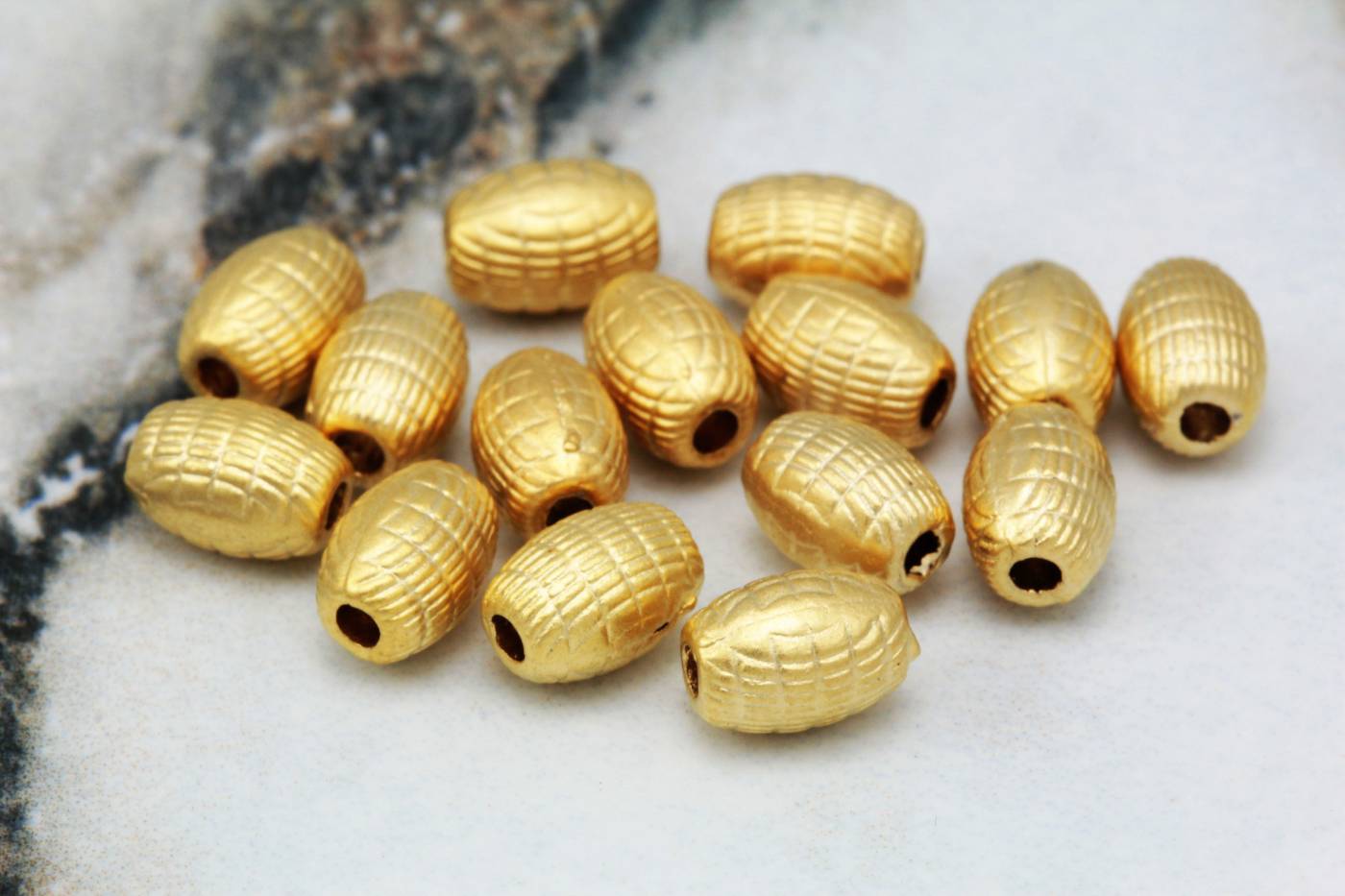 gold-plate-metal-mini-oval-spacer-bead