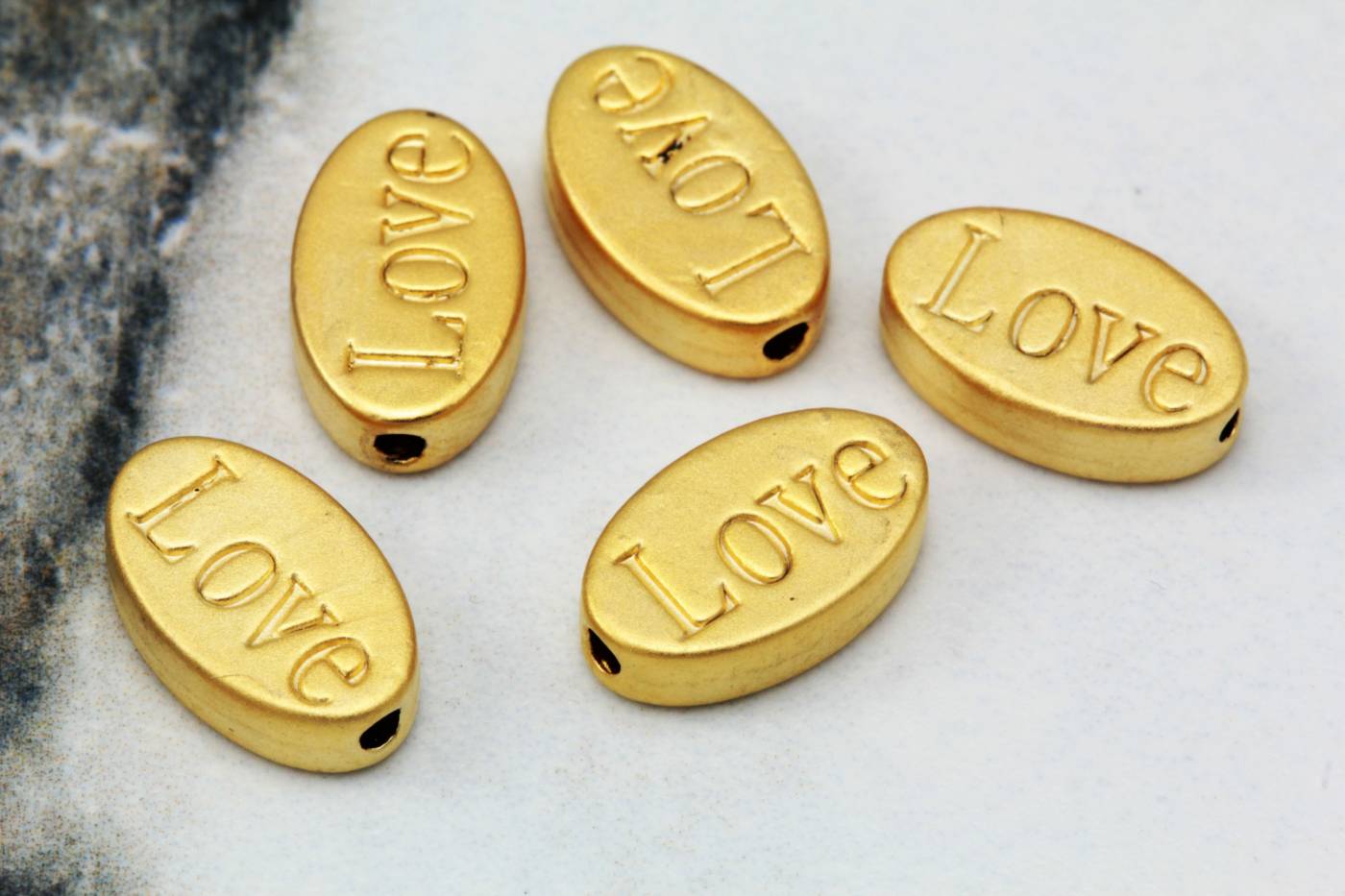 gold-plated-metal-flat-oval-love-charm