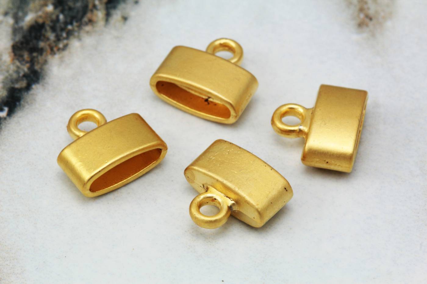 gold-metal-leather-cord-oval-end-caps