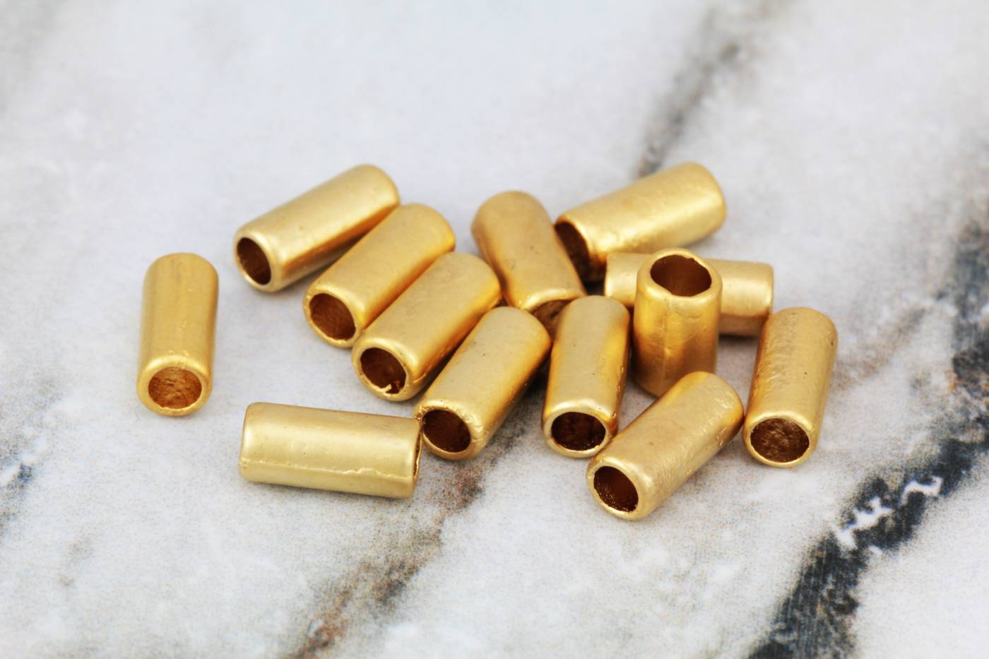 Brass clearance tube beads