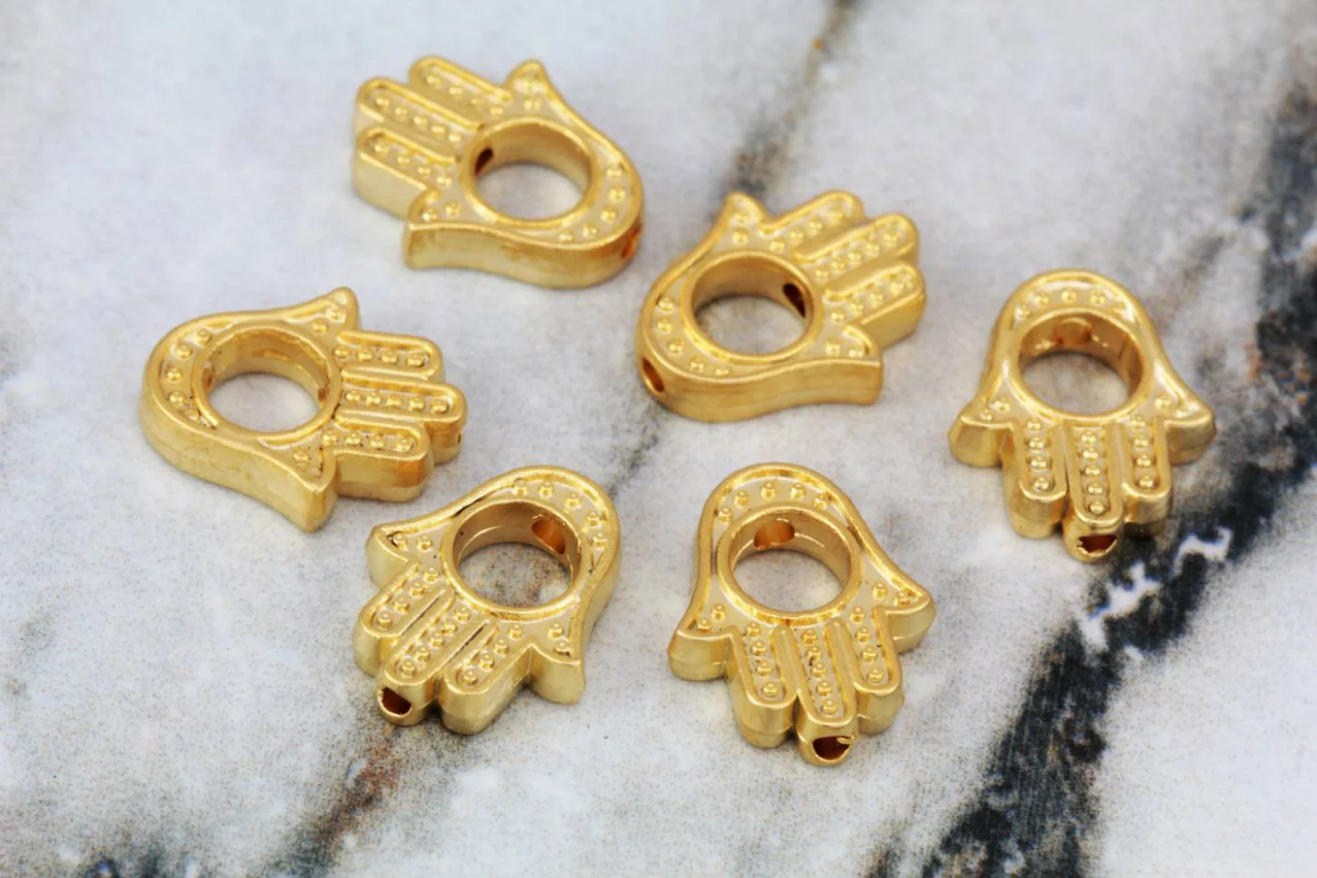 gold-plated-metal-hamsa-charms.