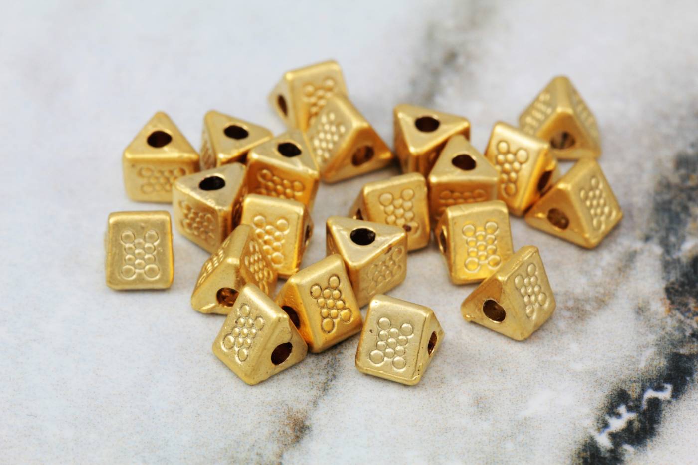 gold-plated-triangle-mini-spacers