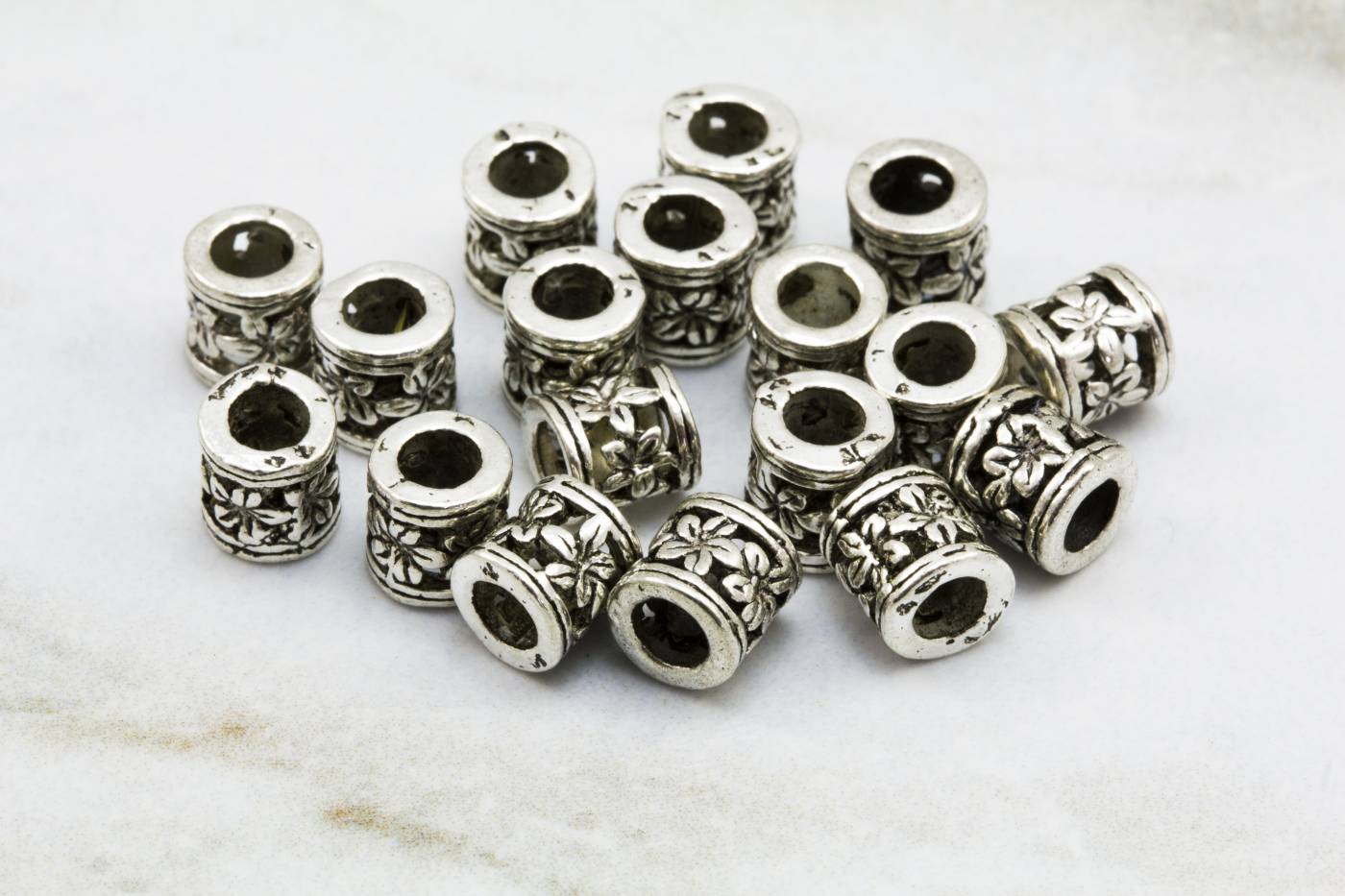 flower-pattern-metal-barrel-beads