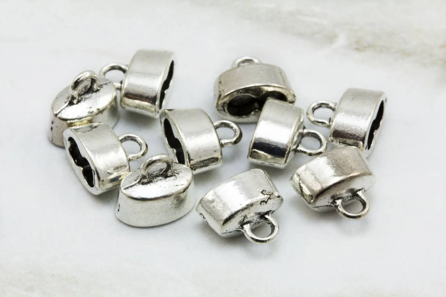 double-hole-metal-round-cap-findings.