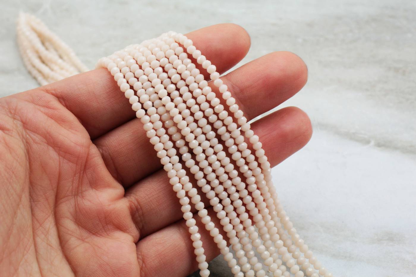 2mm-cream-faceted-crystal-glass-beads