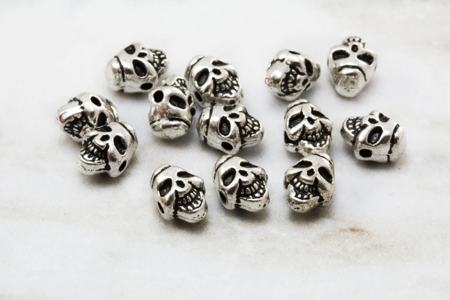 horizontal-hole-skull-head-bead-charm.